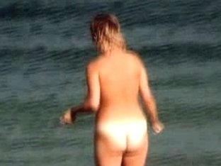 Naked Milf With Huge Melons Loves To Swim On Shore Of The Beach