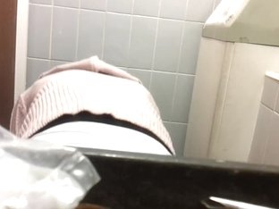 Well Hidden Camera Shot A Female's Back While Pissing