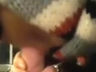 My wife,in disguise, giving me a blow job while i watch t.v.