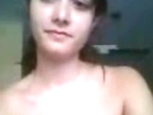 Young Brunette Demonstrating Her Saggy Tits On Webcam