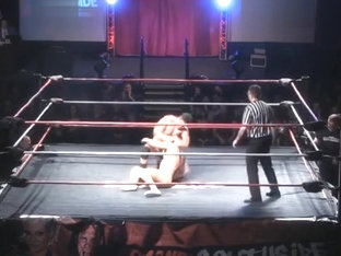 Tatted Irish Muscle Wrestler in Gold Trunks vs Chunky Heel