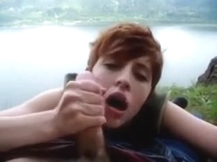 Ryanne blows outdoors