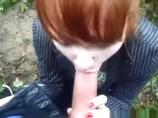 Ponytailed Redhead Girl Gives Her BF A POV Blowjob In Nature