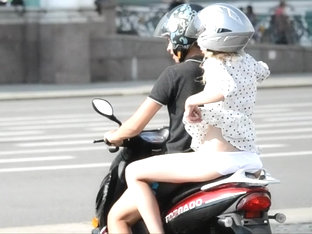 Girl On Motorcycle Shows Some Skin
