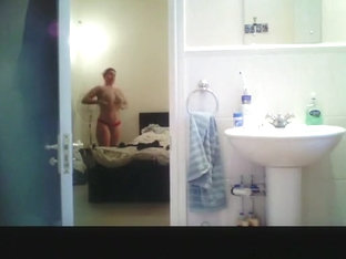 Hidden Camera In Bathroom Catches Busty Chick