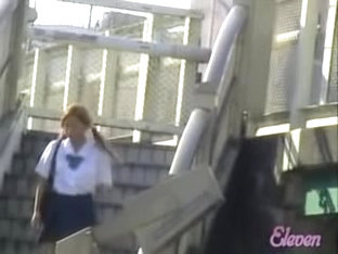 Brisk pig-tailed oriental schoolgirl makes loud sounds when she meets sharking lad