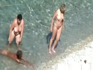 Mature nudist women in the water