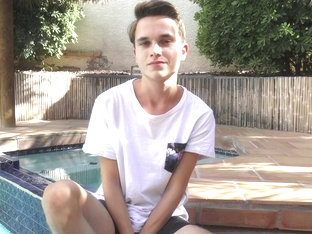 Cute twink Cody Wilson jerks off by the pool