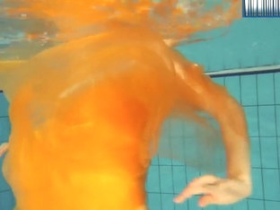 Yellow And Red Clothed Teen Underwater