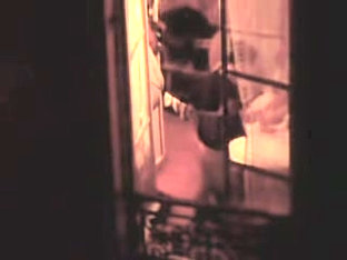 American Tourist Shaking Her Nude Boobs In The Hotel Window