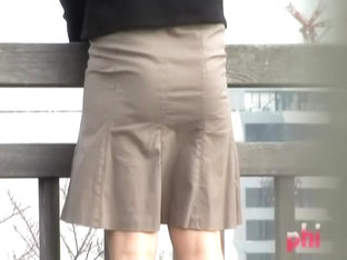 Sexy Japanese slag loses her skirt after someone steals it from her