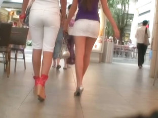 Two Amazing Brunette Fine Ass Sluts In A Shopping Mall Voyeur Upskirt
