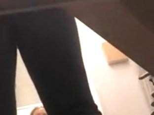 Dressing room spy - shaved blonde goes commando