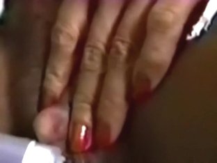 Nasty Ebon Strumpet Rubs Her Massive Love Button With Bide Fake Schlong