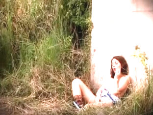 gal masturbating in the field