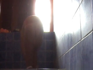 Skinny amateur girl caught taking a shower on camera