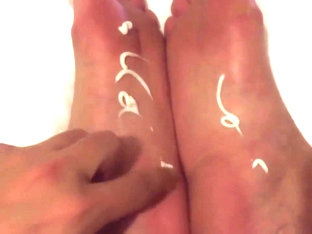 Rubbing lotion into my sexy feet