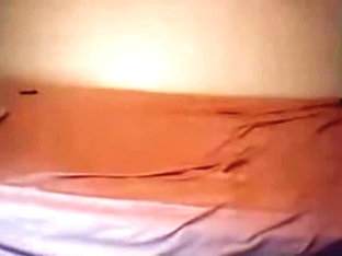 young doing her self in front of the webcam