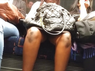 Bare legged teen upskirt on Tube