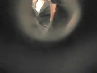 Girl In Change Room Gets Ass Spied Through The Hole