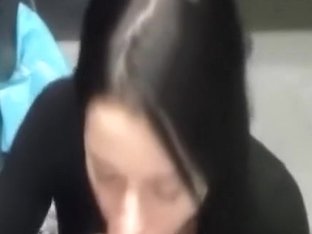 Dark haired girl sucking friends cock