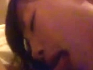 Chinese slut closed her eyes and concentrated on my dick