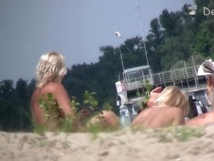 Wide Spread Pussy Lying On A Beach In This Spy Cam Video