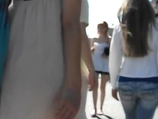 Skinny Hottie In Short White Dress Reveals Her Cunt On Spy Cam