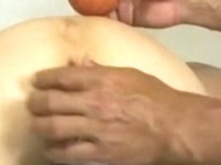 Large Red Apple In Small Oriental Booty