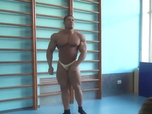 Beefy Bodybuilder in Skimpy Gold Posers