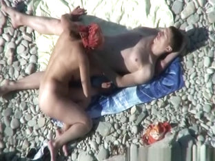 Busty nudist fucked at the beach