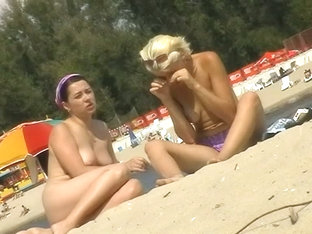 Two Topless Girls Sunbathing In Front Of A Hidden Cam