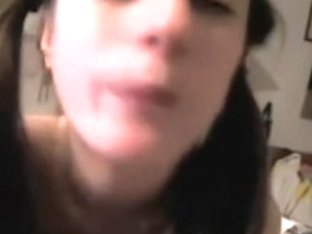 Ponytailed teen sucking cock