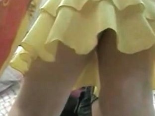 Yellow Skirt Hides Her Succulent Butt Cheeks On Spy Cam