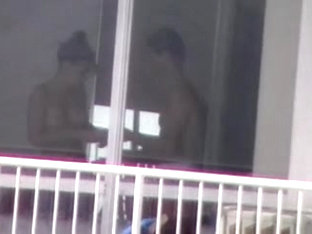 Topless Girl Applying Sunscreen Voyeur Thru Windown In Pr