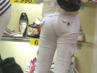 Sweet candid street booty in a shoe store