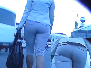 Booty in taut grey breeches