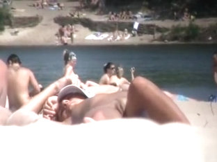 Brunette Nudist Woman Sunbathing