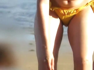 Hot Girl In Yellow Bikini At The Beach