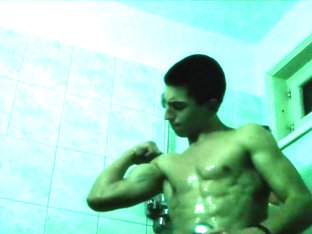 Young Teenboy Flexes Muscles In Store Changing Room Shower