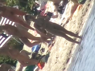 Nude Beach Filled With Hot Babes And An Unsuspicious Voyeur