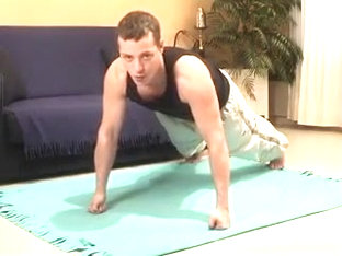 Muscular gay hunk shows off