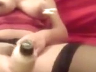 Woman In Red Nighties Pinches Her Own Nipps And Inserts A Biggest Fake Penis