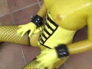 Hot Girl In Latex Glamour Yellow Catsuit Gets To Climax