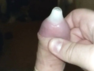 Close up slow motion condom cum