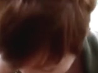 Ryanne blows outdoors