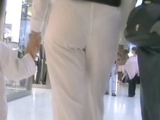 Hot Mature Babe In White Pants In Candid Street Video