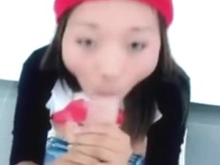 Small oriental engulfing a giant ding-dong