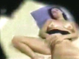Voyeur tapes a girl having some trimmed pussy solo action