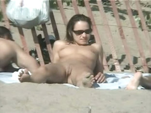 Tempting Women Sunbathing In A Nude Beach Video